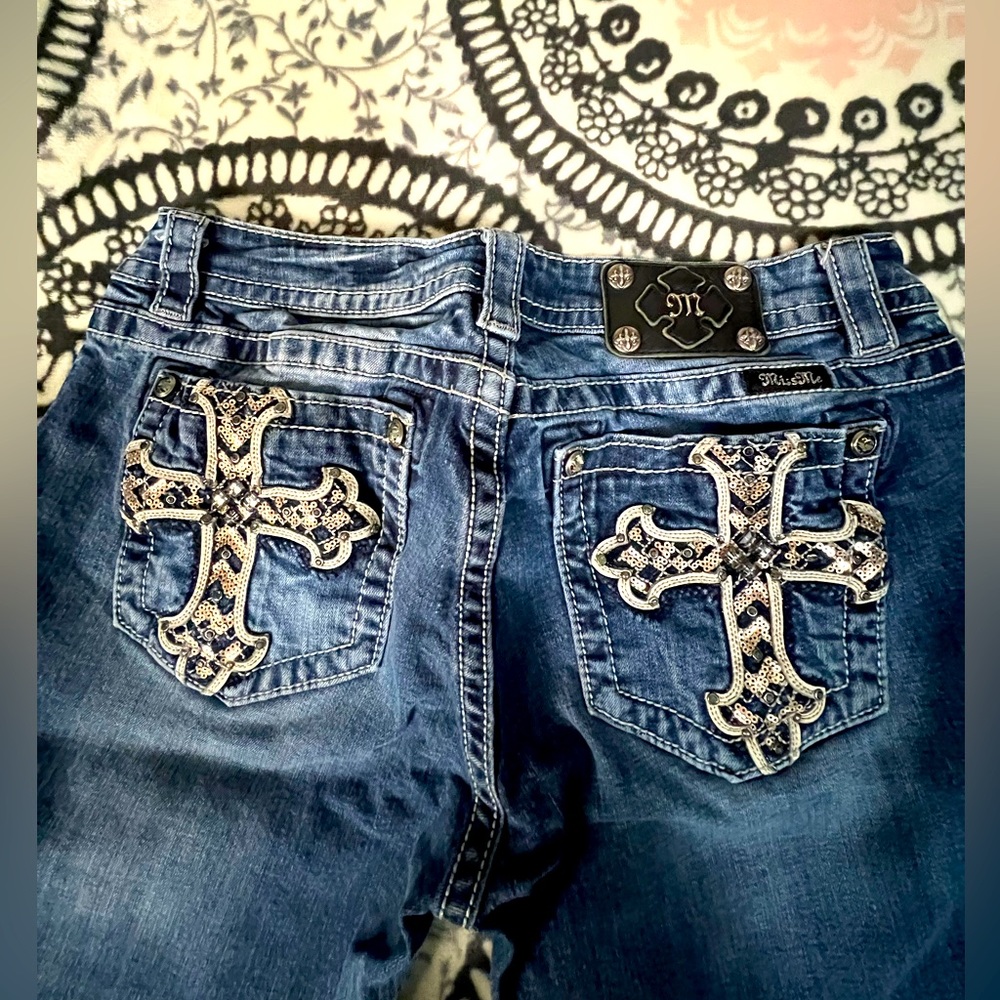 Miss Me jeans size 33 back pocket details. Excellent used condition. $65